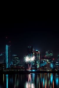Preview wallpaper night city, buildings, fireworks, water, reflection