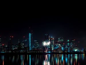 Preview wallpaper night city, buildings, fireworks, water, reflection