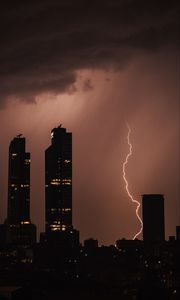 Preview wallpaper night city, buildings, lightning, sky