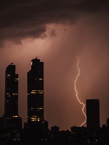 Preview wallpaper night city, buildings, lightning, sky