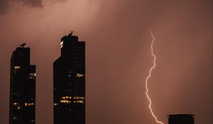 Preview wallpaper night city, buildings, lightning, sky