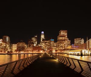 Preview wallpaper night city, buildings, lights, bridge, coast