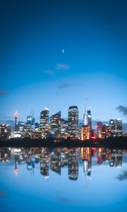 Preview wallpaper night city, buildings, lights, reflection, moon