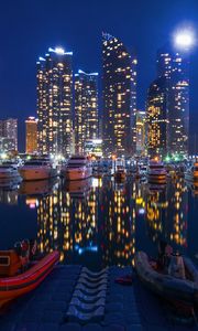 Preview wallpaper night city, buildings, night, sky, boats