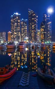 Preview wallpaper night city, buildings, night, sky, boats