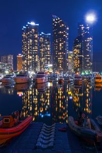 Preview wallpaper night city, buildings, night, sky, boats