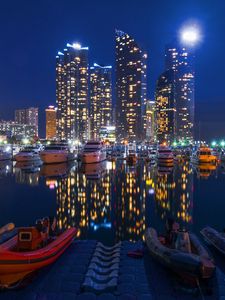 Preview wallpaper night city, buildings, night, sky, boats