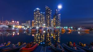 Preview wallpaper night city, buildings, night, sky, boats