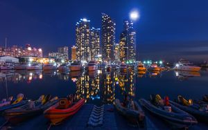 Preview wallpaper night city, buildings, night, sky, boats