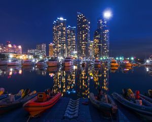 Preview wallpaper night city, buildings, night, sky, boats