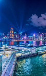 Preview wallpaper night city, buildings, rays, port, sea