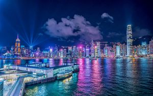 Preview wallpaper night city, buildings, rays, port, sea