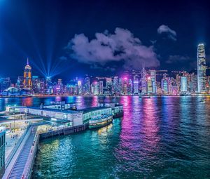 Preview wallpaper night city, buildings, rays, port, sea