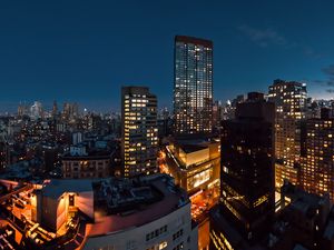 Preview wallpaper night city, buildings, roofs