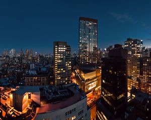 Preview wallpaper night city, buildings, roofs