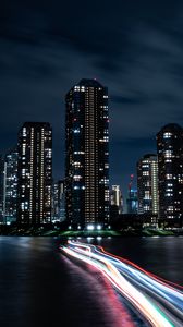 Preview wallpaper night city, buildings, skyscrapers, coast, lights, long exposure