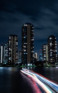 Preview wallpaper night city, buildings, skyscrapers, coast, lights, long exposure