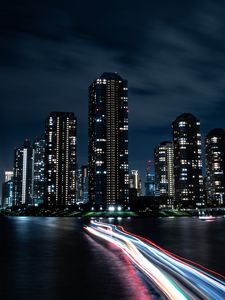Preview wallpaper night city, buildings, skyscrapers, coast, lights, long exposure