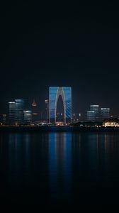 Preview wallpaper night city, buildings, skyscrapers, water