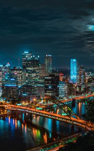 Preview wallpaper night city, buildings, skyscrapers, bridge, river