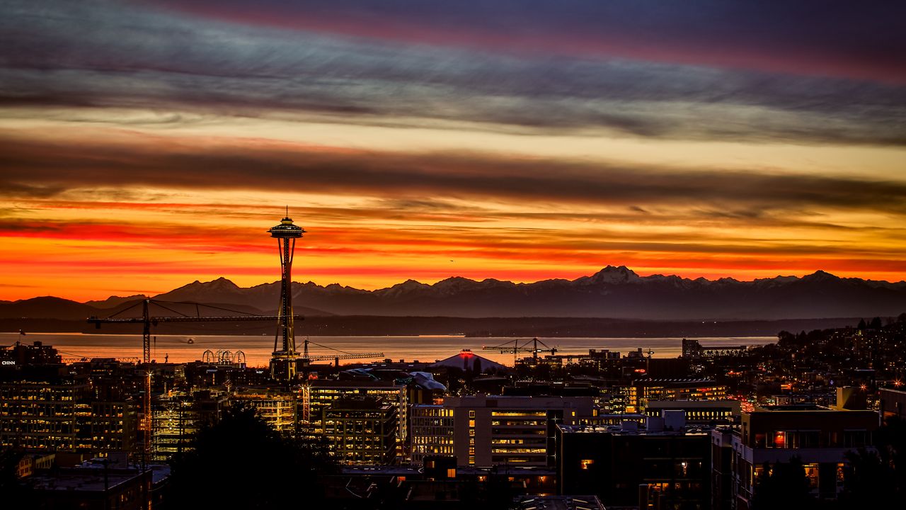 Wallpaper night city, buildings, tower, sunset, mountains