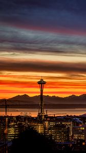Preview wallpaper night city, buildings, tower, sunset, mountains
