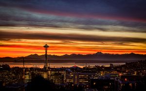 Preview wallpaper night city, buildings, tower, sunset, mountains
