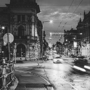 Preview wallpaper night city, bw, street, movement, szeged, hungary