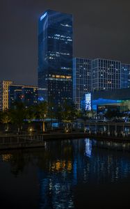 Preview wallpaper night city, city, buildings, lights, pier