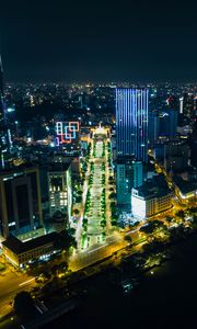 Preview wallpaper night city, city, buildings, road, aerial view