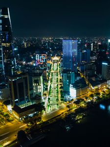 Preview wallpaper night city, city, buildings, road, aerial view