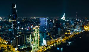 Preview wallpaper night city, city, buildings, road, aerial view