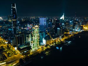 Preview wallpaper night city, city, buildings, road, aerial view