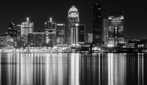 Preview wallpaper night city, city, buildings, lights, water, reflection, black and white