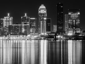 Preview wallpaper night city, city, buildings, lights, water, reflection, black and white