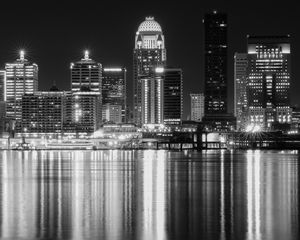 Preview wallpaper night city, city, buildings, lights, water, reflection, black and white