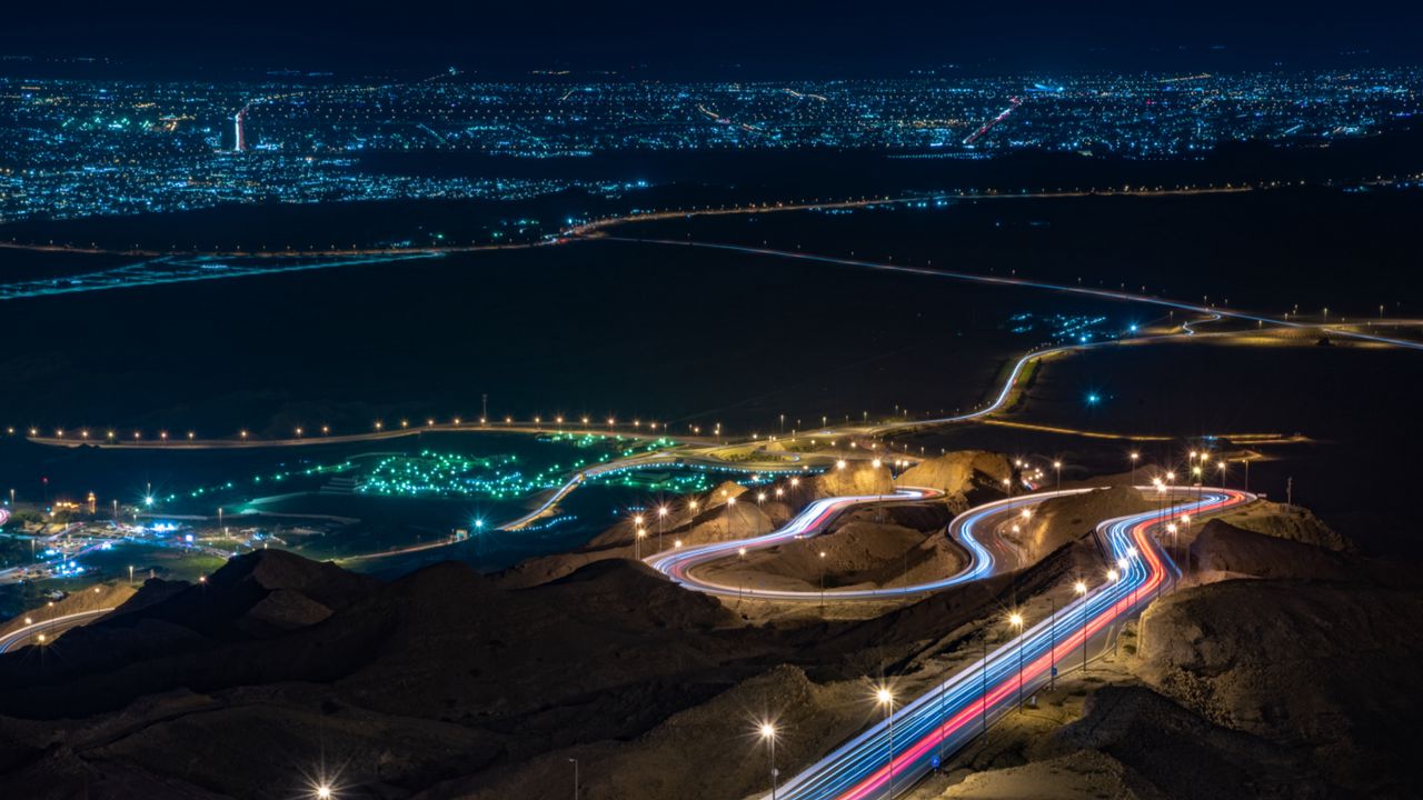 Wallpaper night city, city lights, long exposure, road, abu dhabi, united arab emirates