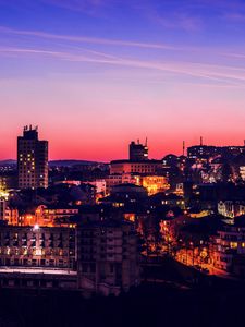 Preview wallpaper night city, city lights, sunset, buildings, sky, architecture