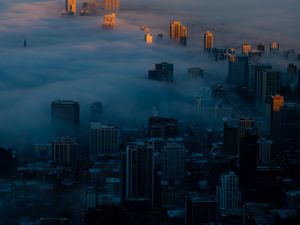 Preview wallpaper night city, clouds, aerial view, fog, skyscrapers