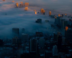 Preview wallpaper night city, clouds, aerial view, fog, skyscrapers