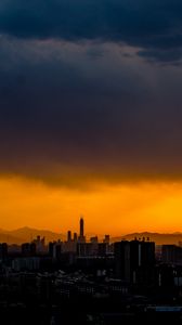 Preview wallpaper night city, clouds, sunset, dark