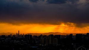 Preview wallpaper night city, clouds, sunset, dark