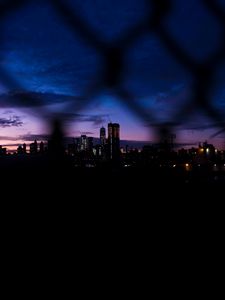 Preview wallpaper night city, fence, dark, skyscrapers