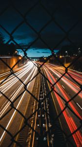 Preview wallpaper night city, fence, mesh, road, long exposure