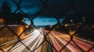 Preview wallpaper night city, fence, mesh, road, long exposure