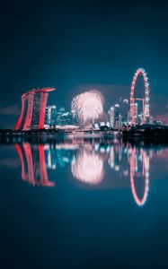 Preview wallpaper night city, fireworks, buildings, water, reflection