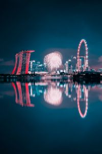 Preview wallpaper night city, fireworks, buildings, water, reflection
