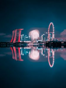 Preview wallpaper night city, fireworks, buildings, water, reflection