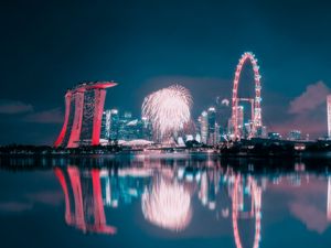 Preview wallpaper night city, fireworks, buildings, water, reflection