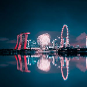 Preview wallpaper night city, fireworks, buildings, water, reflection